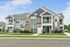Apartment building exterior at Seasons at Plainfield Apartments in Plainfield, Illinois.