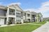Apartment building exterior at Seasons at Plainfield Apartments in Plainfield, Illinois.