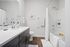 Apartment bathroom interior at Seasons at Plainfield Apartments in Plainfield, Illinois.