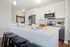 Apartment kitchen interior at Seasons at Plainfield Apartments in Plainfield, Illinois.
