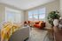 Apartment living room interior at Seasons at Plainfield Apartments in Plainfield, Illinois.