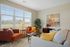 Apartment living room interior at Seasons at Plainfield Apartments in Plainfield, Illinois.