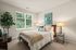 Apartment bedroom interior at Seasons at Plainfield Apartments in Plainfield, Illinois.