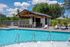 Resort-style swimming pool with lounge seating at Echelon at Charlotte