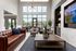 Resident clubhouse lounge with fireplace and comfortable seating at Seasons at Orchard Hills in Oak Creek, Wisconsin.