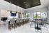 Resident clubhouse kitchen with bar seating at Seasons at Orchard Hills in Oak Creek, Wisconsin.