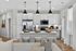 an island, bright cabinetry and contemporary finishes. Modern kitchen at Echelon at Cary apartments