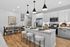 an island, bright cabinetry and contemporary finishes. Modern kitchen at Echelon at Cary apartments