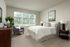 Bedroom at Seasons at North Aurora Apartments.
