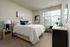 Bedroom at Seasons at North Aurora Apartments.