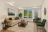 Inviting living room with stylish sofa, chic decor, and large window showcasing natural light and scenic views.