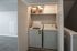 Modern apartment laundry area with energy-efficient washer and dryer, perfect for convenient living.
