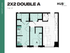 Modern 2x2 Double A floor plan at HUB East Lansing with 746 sq ft, featuring two shared bedrooms, a spacious living area, and a fully equipped kitchen.