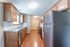 Oakwood-Heights-Townhomes-Republic-Missouri-Phase-1-Three-Bedroom-Remodeled-Kitchen-Hallway-View