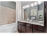Ceramic tile in foyers, kitchens and baths