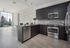 Open floorplan living rooms with Kember wood-style floors