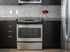 Stainless steel appliances and modern backsplashes