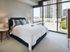 Bedrooms with oversized windows, 10 ft ceilings and natural light