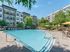 Resort style swimming pool with lounge seating
