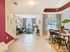 AMLI Toscana Place, interior, seating area, stairs, pink accent wall, spotted wall, dining table