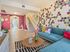 AMLI Toscana Place, interior, seating area, stairs, pink accent wall, spotted wall