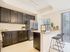 AMLI Toscana Place, interior, kitchen, breakfast bar seating, window, dark cabinets, stainless steel appliances
