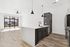 Renovated kitchen and living room at AMLI Old 4th Ward