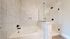 AMLI North Park bathroom with tub and walk-in glass shower