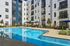Pool deck with lounge chairs and umbrellas at AMLI Old 4th Ward