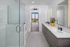 Bathroom with shower and double vanities