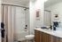 Elevated bathroom with warm finish package