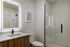 Designer bathroom with walk-in shower