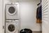Mudroom with full-size washer and dryer