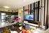 Kitchens with quartz countertops and stainless steel appliances