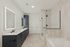 Double vanities and dual tub, showers