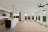 Spacious open-concept with floor-to-ceiling windows