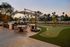 Outdoor gathering space with putting green