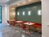 Chic and modern dining area with cozy seating and stylish lighting, perfect for intimate gatherings.
