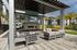 The Addison Universal Blvd Outdoor Fireplace and Seating