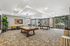 Elegant recreational room with modern pool tables, stylish seating, and chic decor, perfect for entertaining and relaxation.