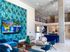 furnished clubroom with high ceilings