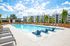 exterior pool with apartment building in daytime