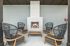furnished patio area with seating and fireplace