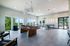 furnished clubroom with billiards table and seating