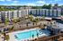 exterior apartment building with pool in daytime