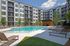 Pool and sundeck on sunny day