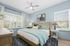 Guest bedroom with bed and dresser