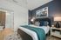 bedroom with bed and side tables