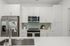 kitchen with large island and white cabinets