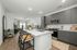 kitchen with large island and grey cabinets